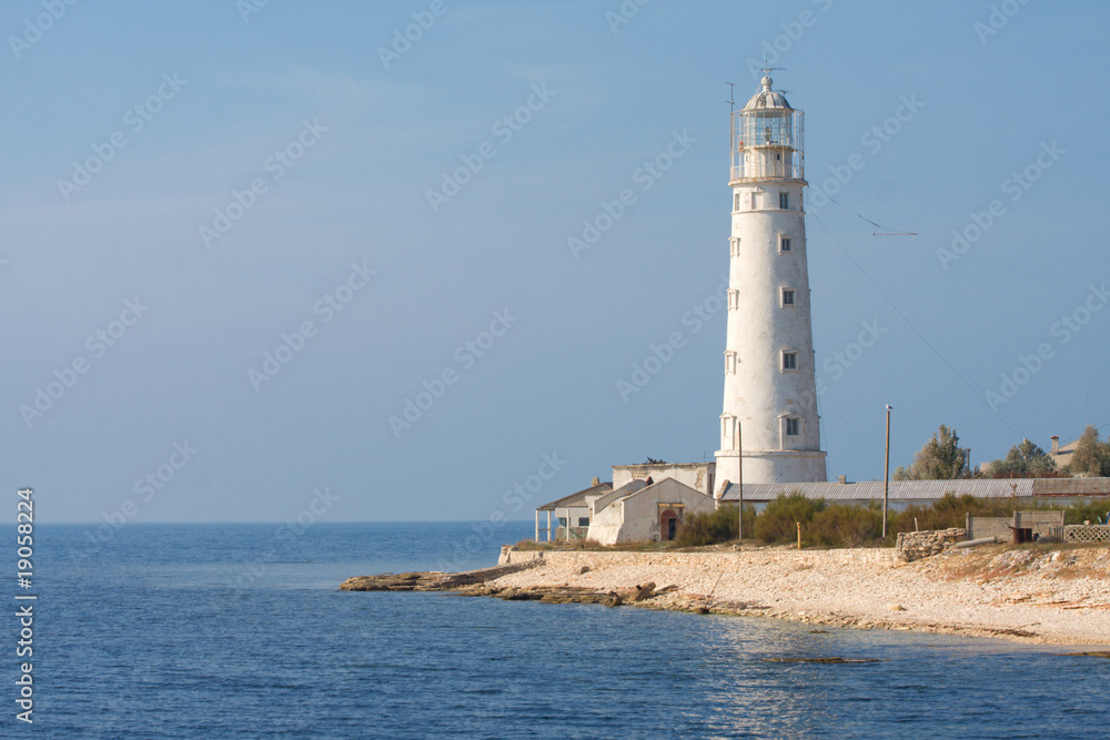 Lighthouse and sea.