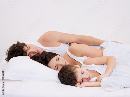 Sleeping family with the little son