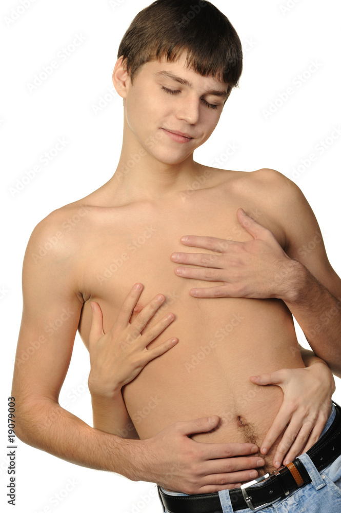 Young the man with female and hands on a torso Young the man with female and hands on a torso