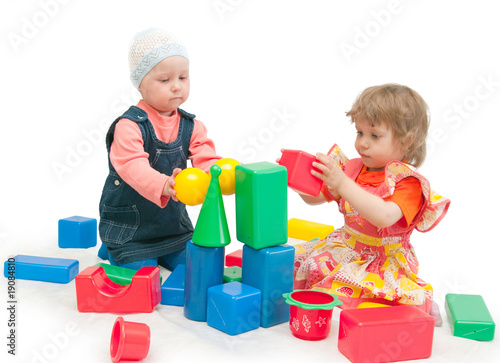Two children play cubes