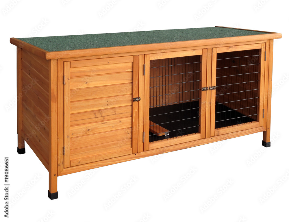 Naklejka premium Wooden rabbit hutch isolated over white.