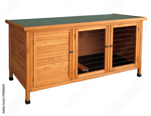 Wooden rabbit hutch isolated over white.