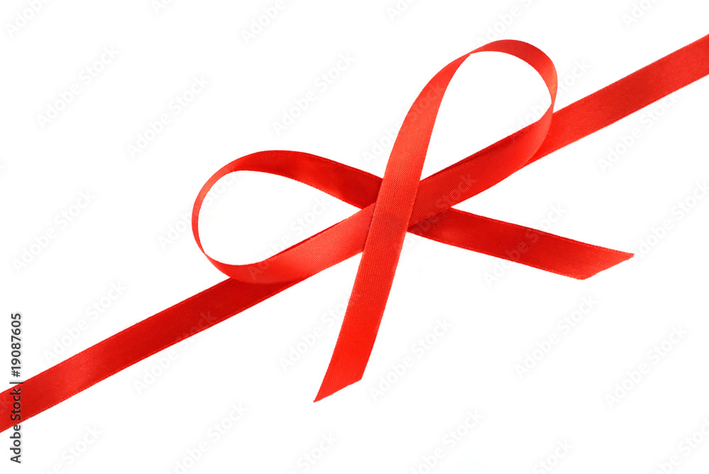 Red holiday bow on white background. Red holiday bow on white background.