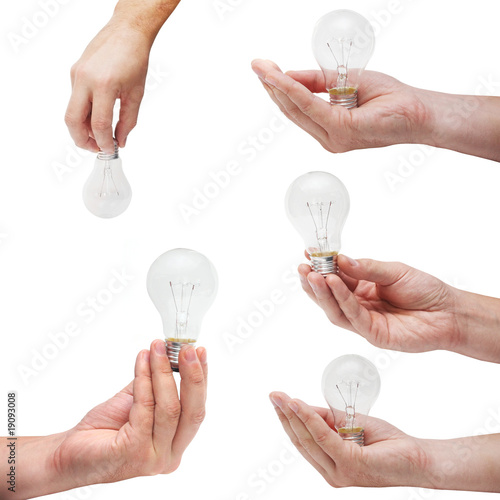 Set of energy bulbs in human hands