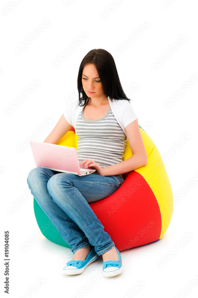 Girl working on laptop isolated on white Girl working on laptop isolated on white