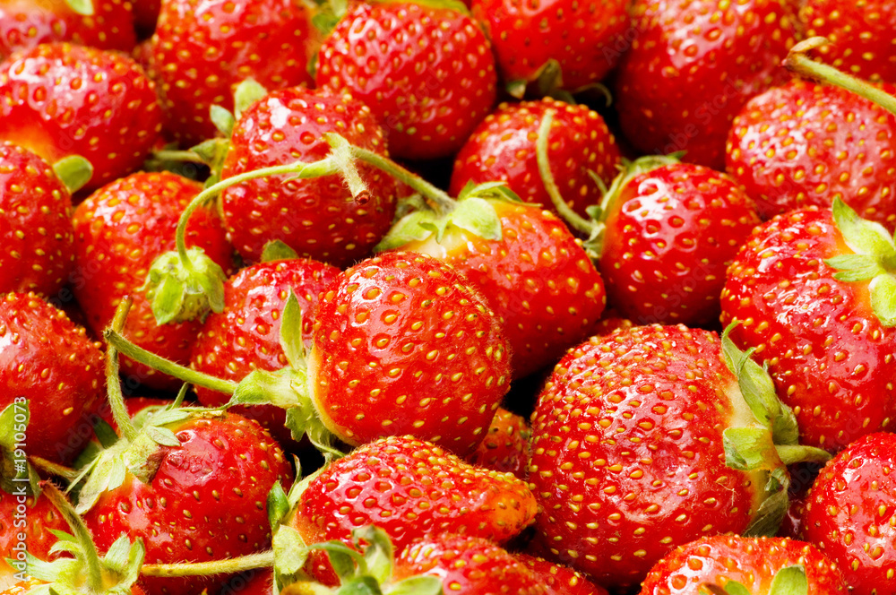 Lots of strawberries arranged as the background Lots of strawberries arranged as the background