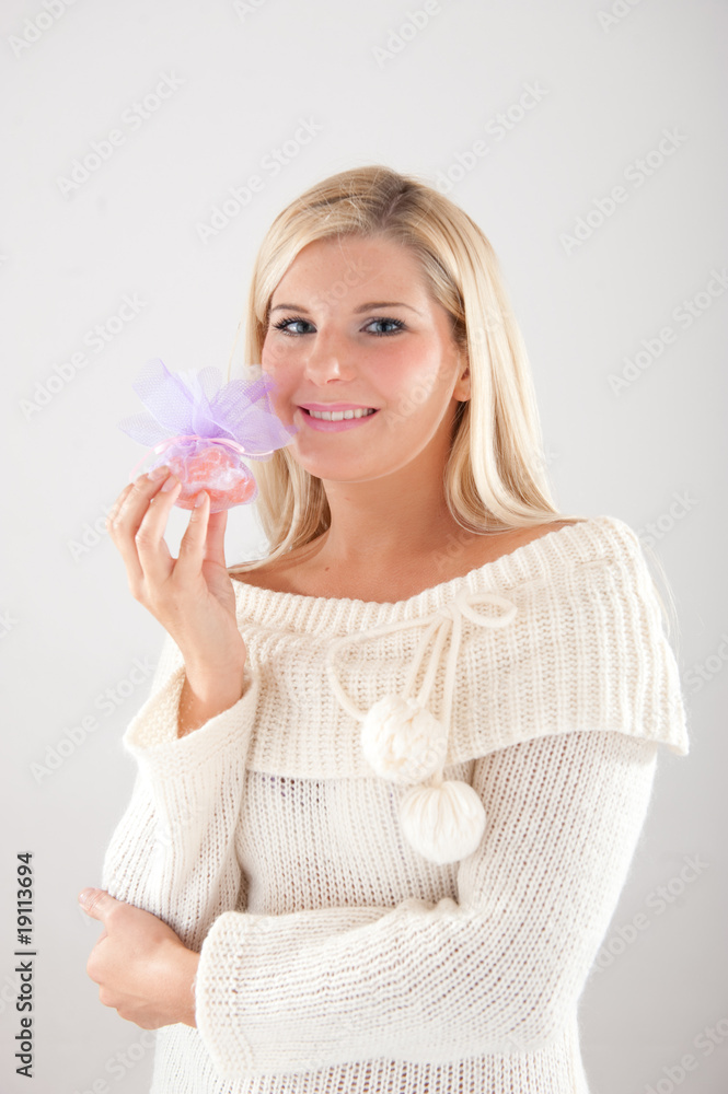 young beautiful winter woman with little present young beautiful winter woman with little present