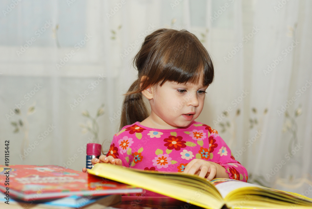 child reading the book child reading the book
