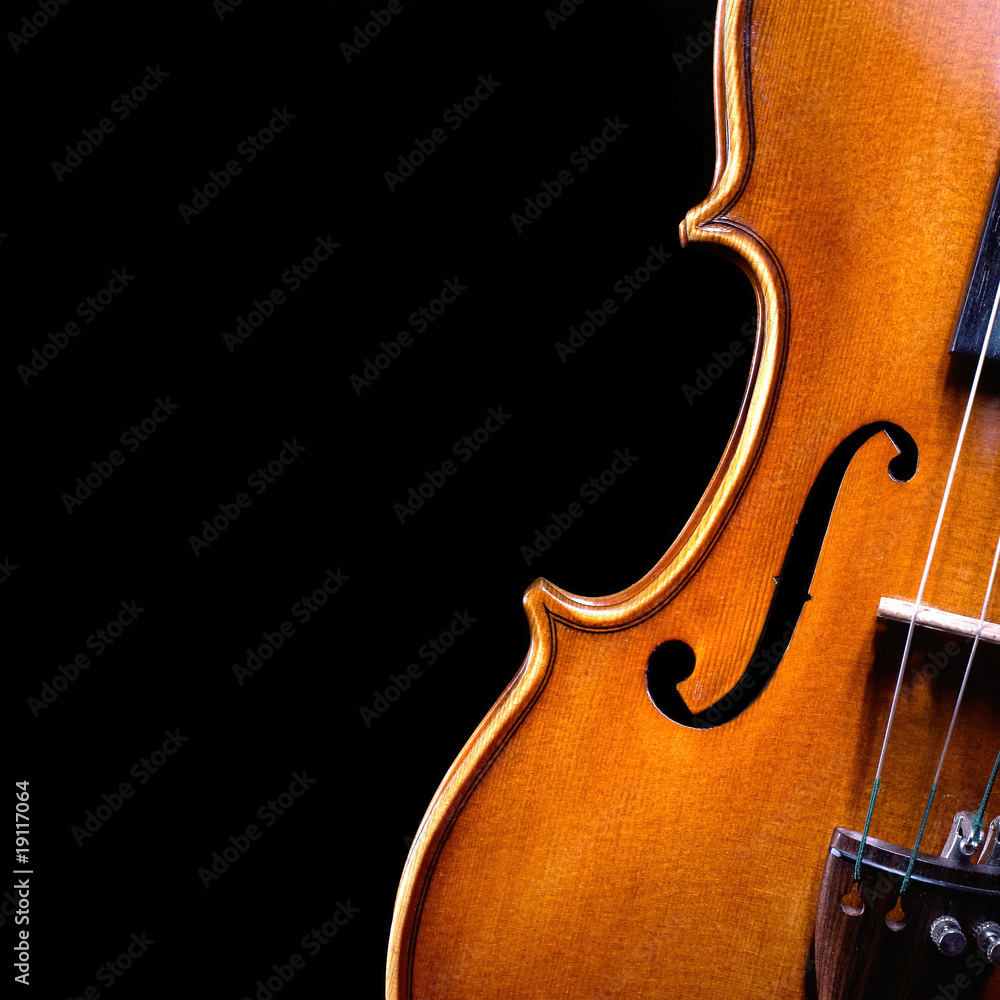 Naklejka premium vintage violin over dark background