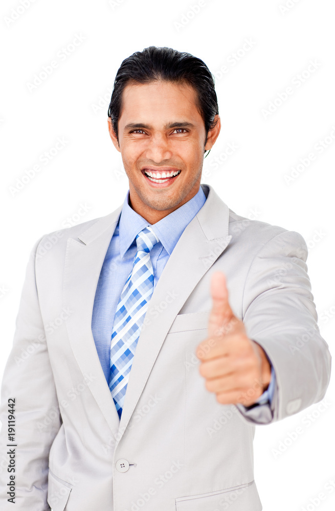 Young businessman with thumb up celebrating a victory Young businessman with thumb up celebrating a victory