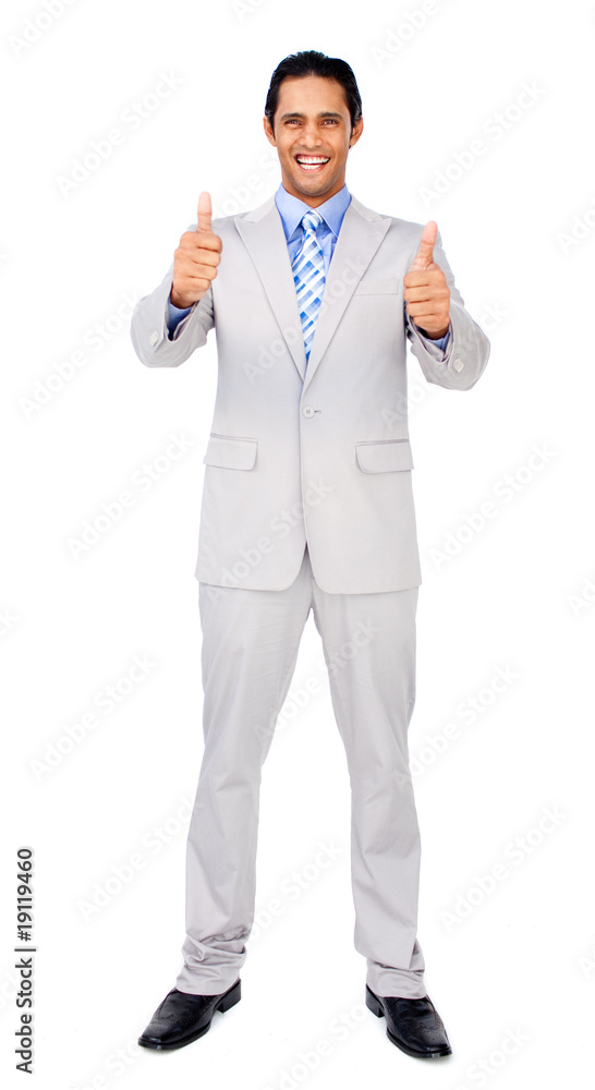 Successful businessman standing with thumbs up Successful businessman standing with thumbs up