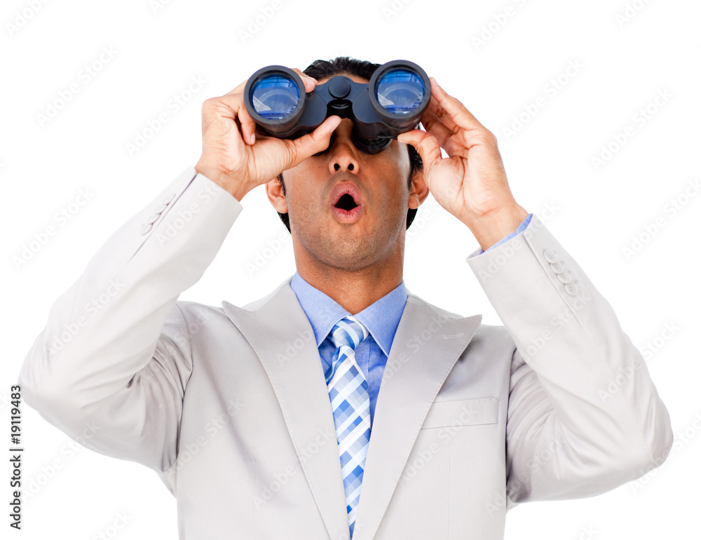 Surprised businessman looking through binoculars Surprised businessman looking through binoculars