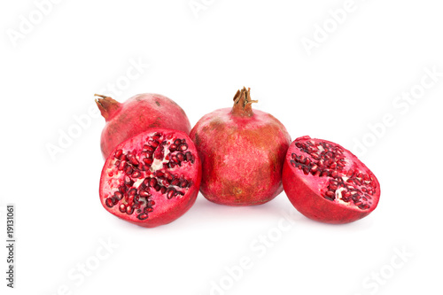 Sliced pomegranate isolated on white
