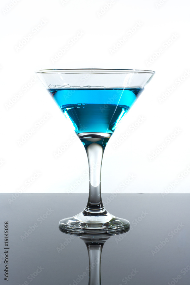 blue drink alcohol in a glass on the table