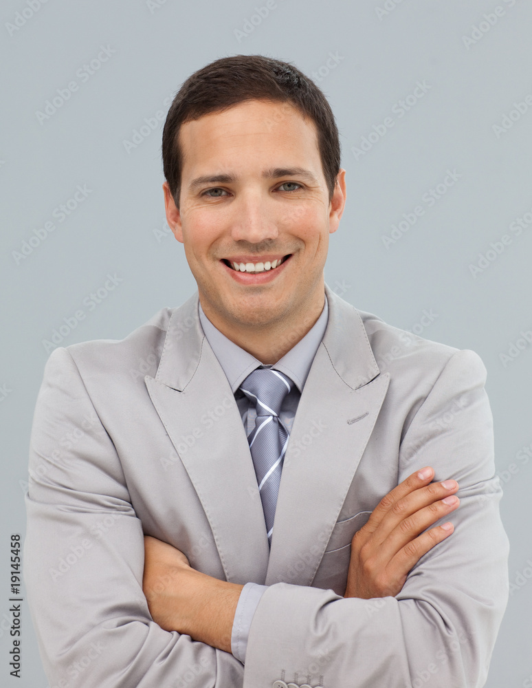 Attractive businessman with folded arms Attractive businessman with folded arms