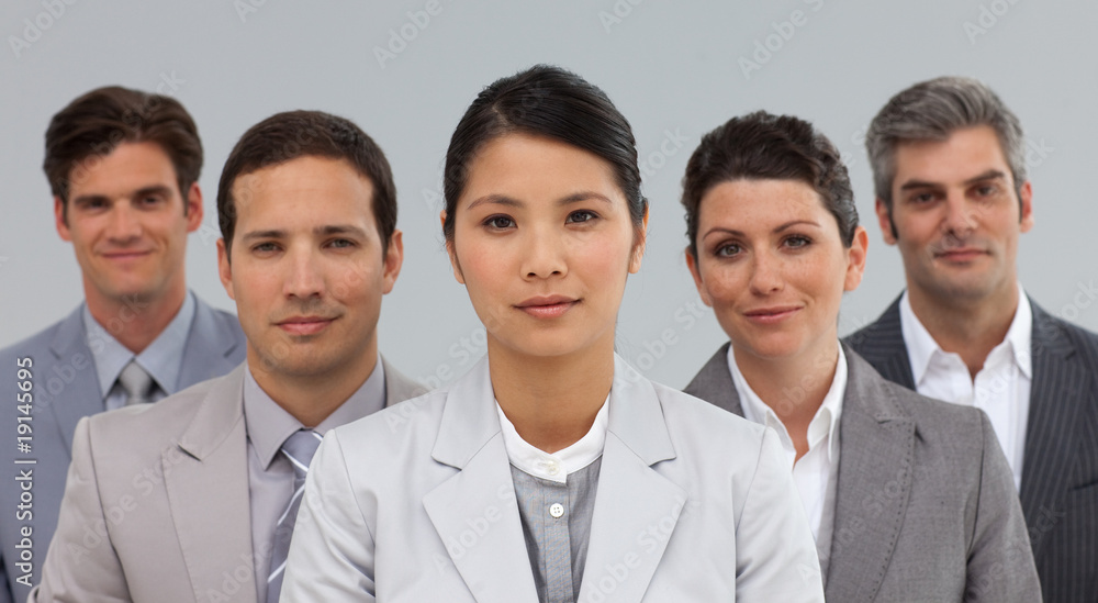 Diverse Business partners standing in a line Diverse Business partners standing in a line