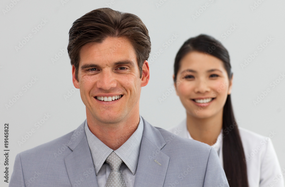 Multi-ethnic Business co-workers standing in a line Multi-ethnic Business co-workers standing in a line