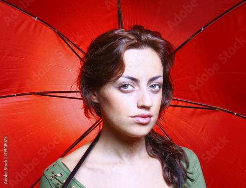Woman with a red umbrela