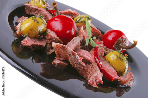 well down meat slices on dish