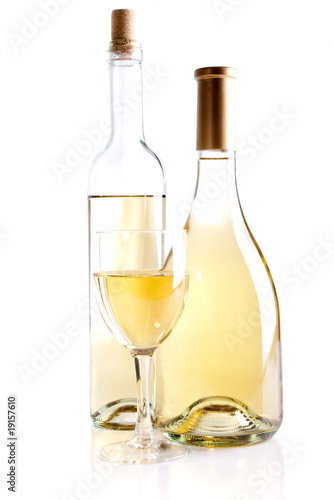 wine bottles and glass over white background