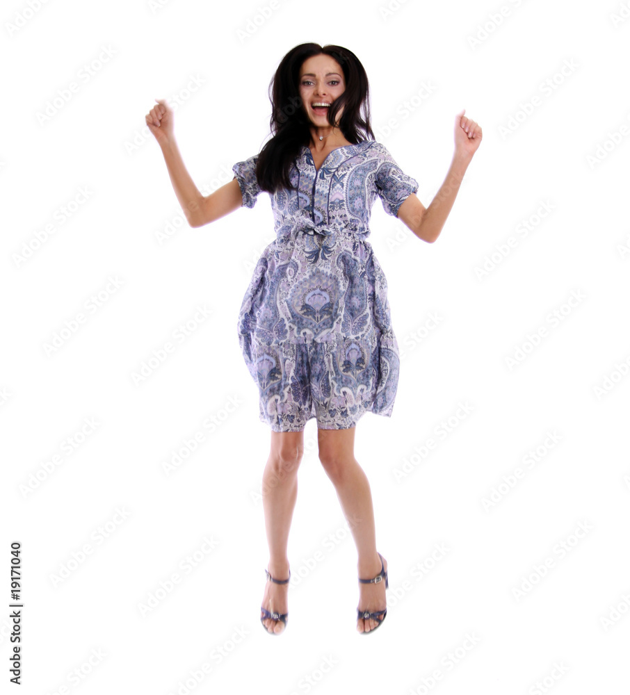 Full length of a beautiful young lady jumps with joy Full length of a beautiful young lady jumps with joy