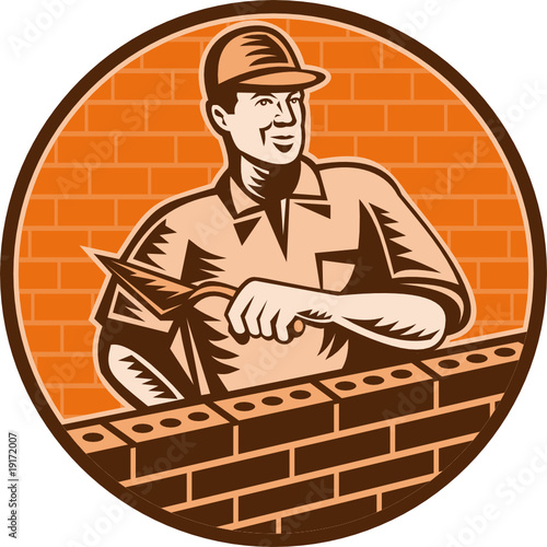 Mason worker bricklayer trowel working on brick wall