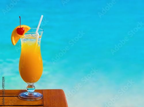 Orange cocktail on table