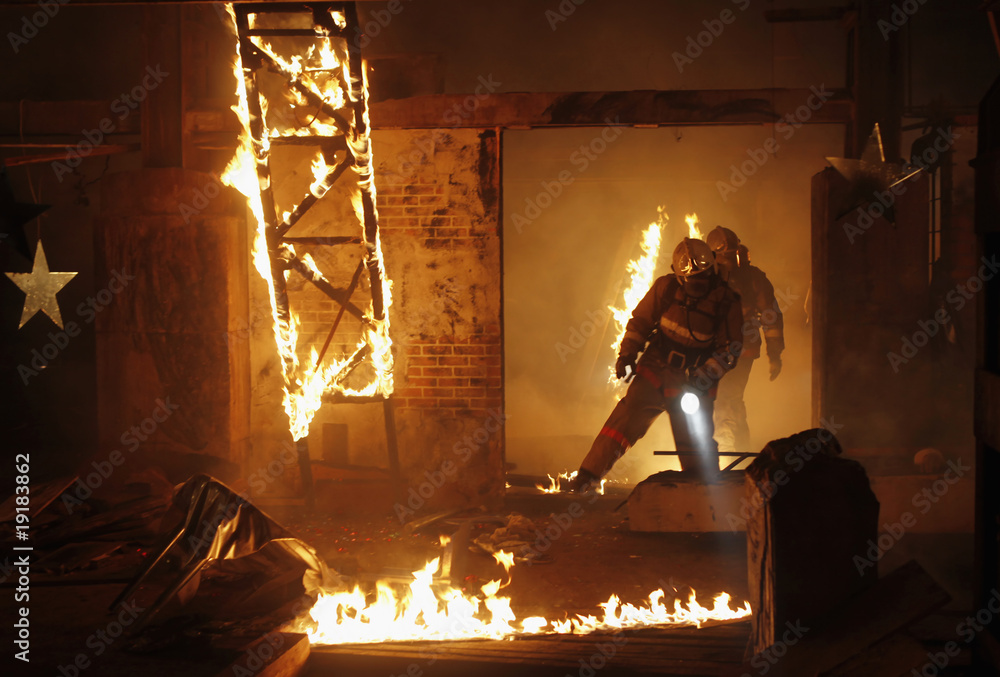 Naklejka premium Rescuers search victims on fire
