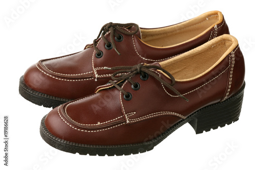 Old-fashioned female shoes on a white background