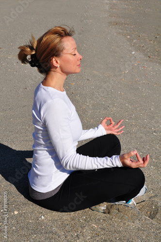 Woman in a yoga posture photo