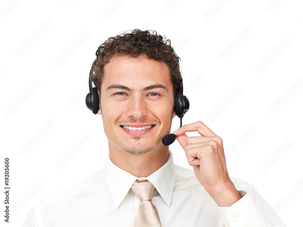 Charismatic latin businessman using headset Charismatic latin businessman using headset