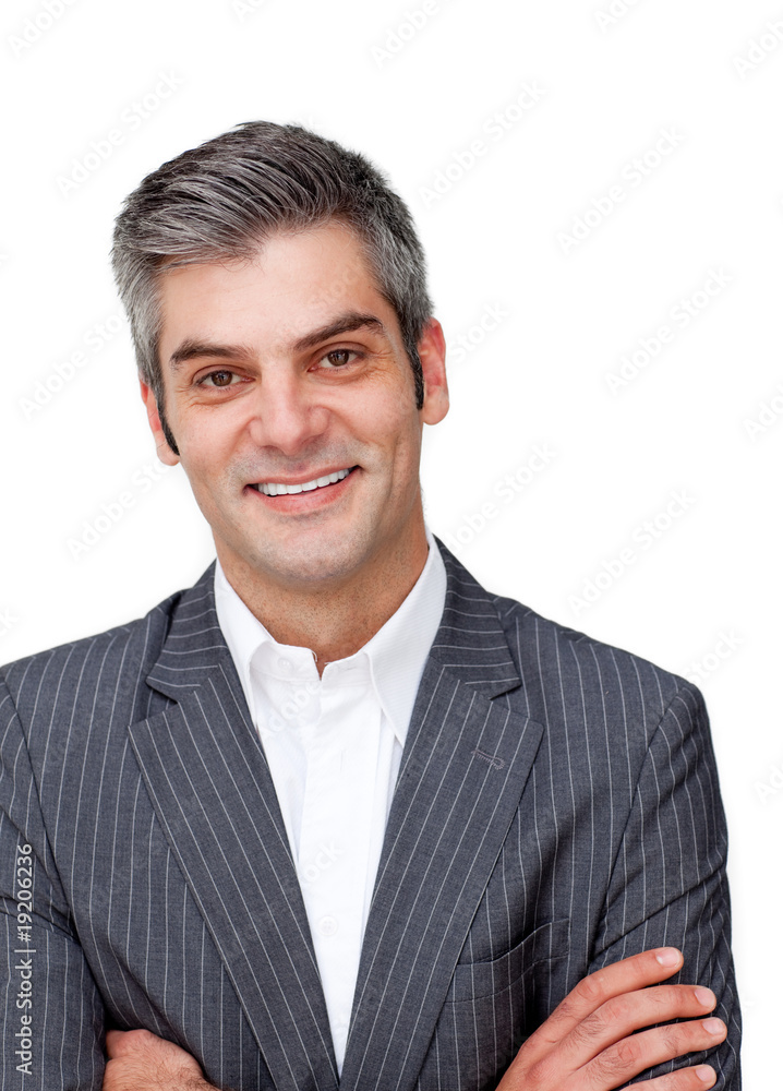 Assertive mature businessman with folded arms Assertive mature businessman with folded arms