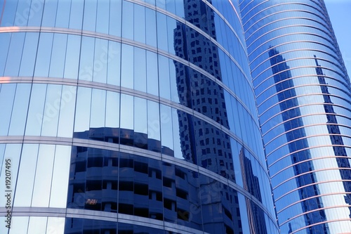 Blue mirror glass facade skyscraper buildings