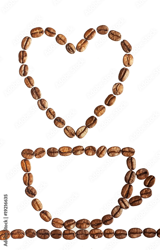 Coffee cup with heart made of beans isolated on white Coffee cup with heart made of beans isolated on white