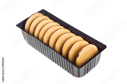Some cookies in a box isolated on a white background.