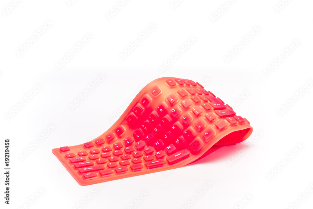 magenta flexible keyboard isolated on white background magenta flexible keyboard isolated on white background