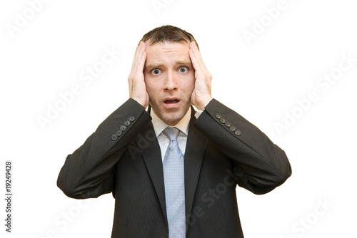 scared businessman on white background