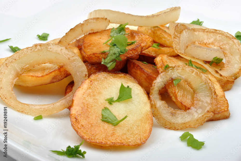 roasted potato with organic onion on a plate roasted potato with organic onion on a plate