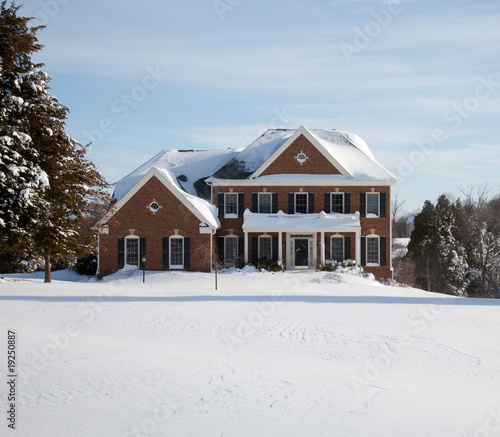 Modern single family home in snow