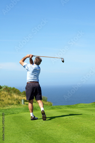 Senior golfer playing golf