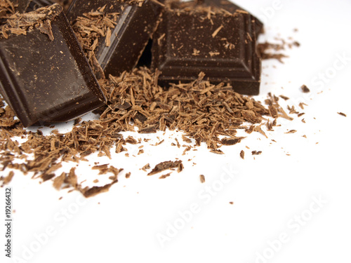 Bars of chocolate on white background