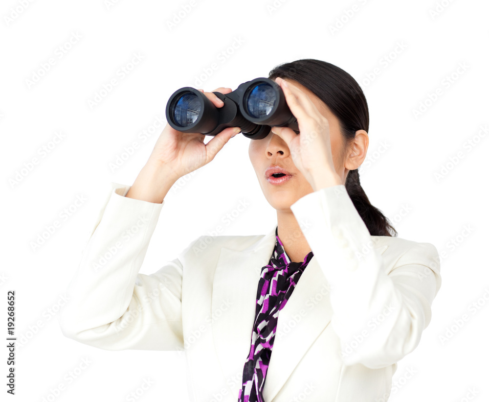 Surprised businesswoman looking through binoculars Surprised businesswoman looking through binoculars