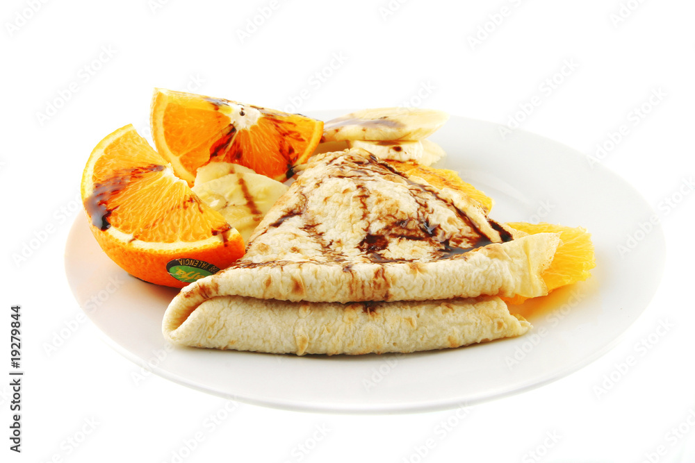pancake with orange on dish pancake with orange on dish
