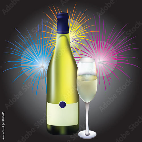 Glass and bottle of champagne and fireworks