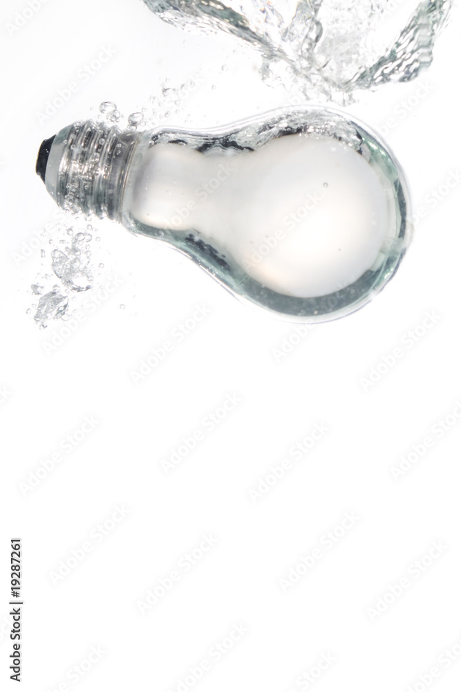 A light bulb falling in clear water A light bulb falling in clear water
