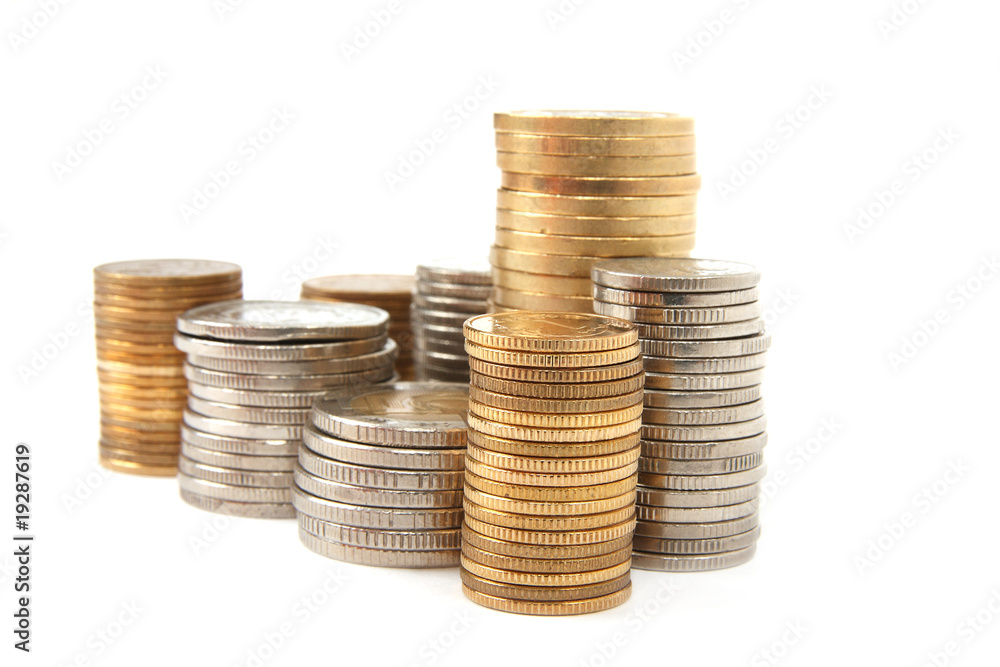Golden and silver coins isolated on white background Golden and silver coins isolated on white background