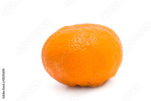 Fresh orange mandarin over isolated white background
