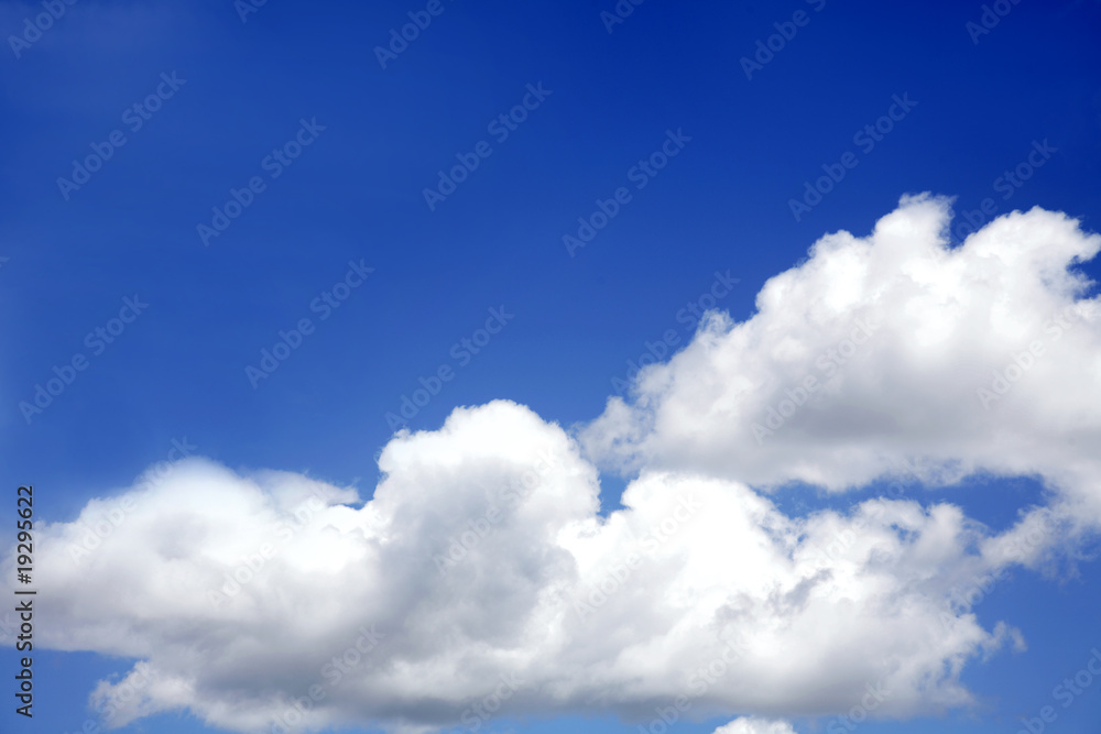 White fluffy soft clouds in blue sky White fluffy soft clouds in blue sky