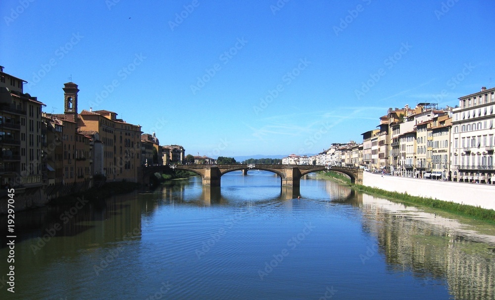 Bridge and old buildings on the river Arno