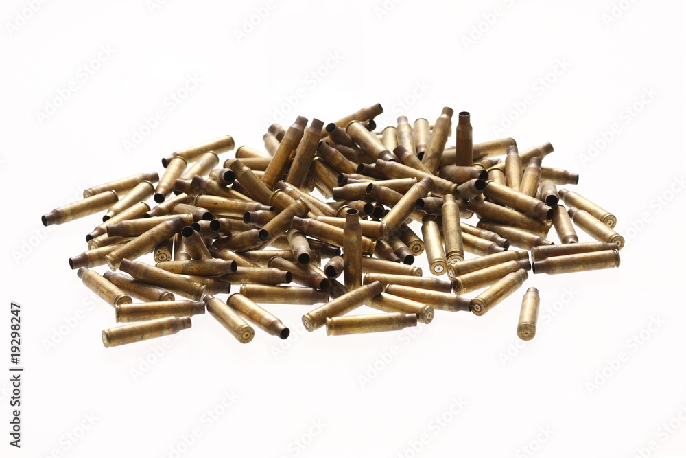 Pile of spent bullet casings. Stock Photo